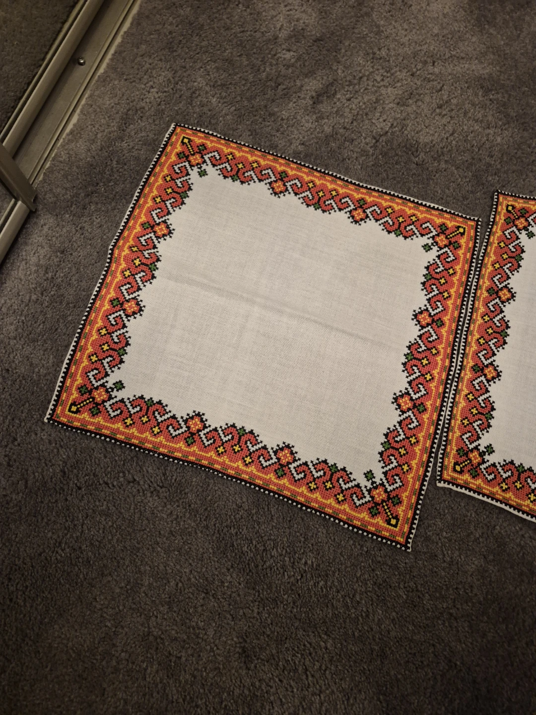 Set of three hand embroidered linen napkins