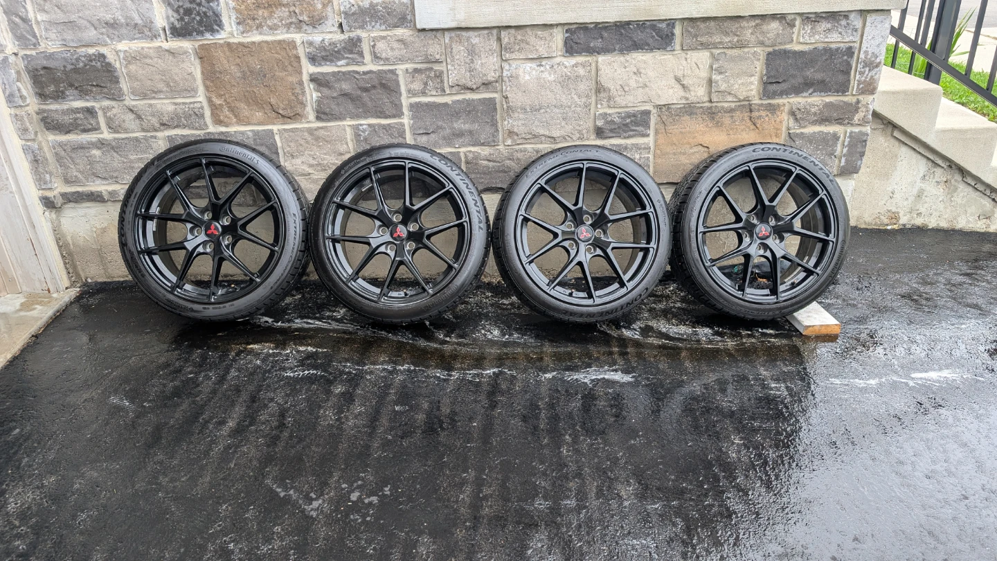 Set of 4 Black Alloy Wheels with Continental Tires