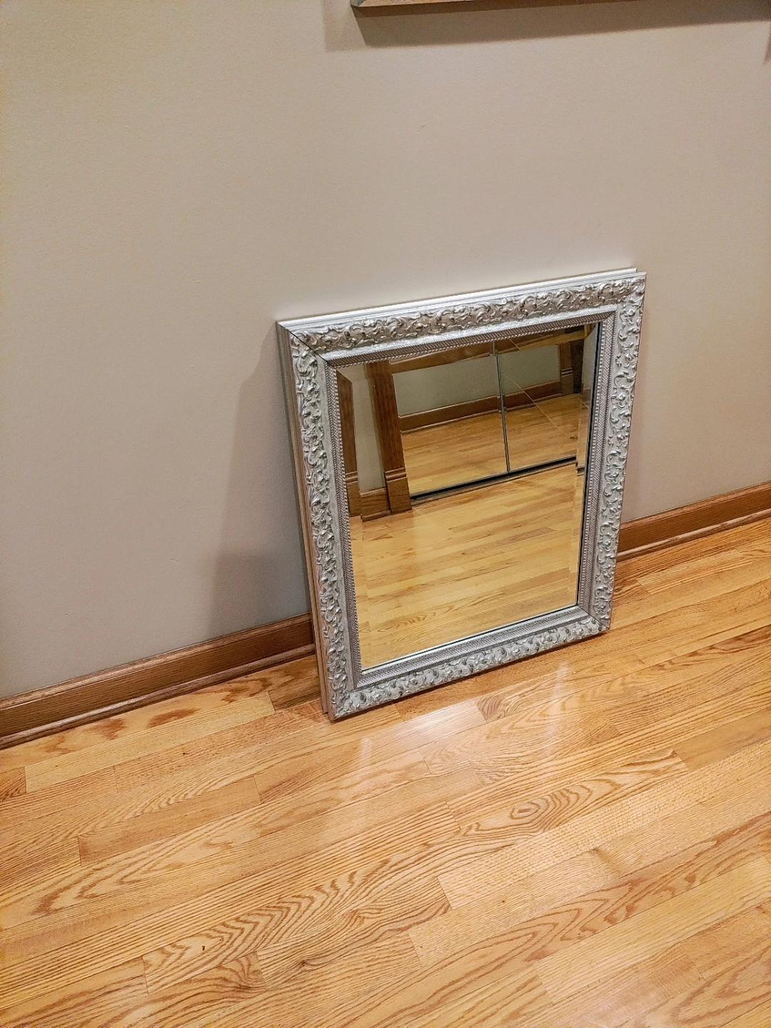Ornate Silver Framed Wall Mirror
