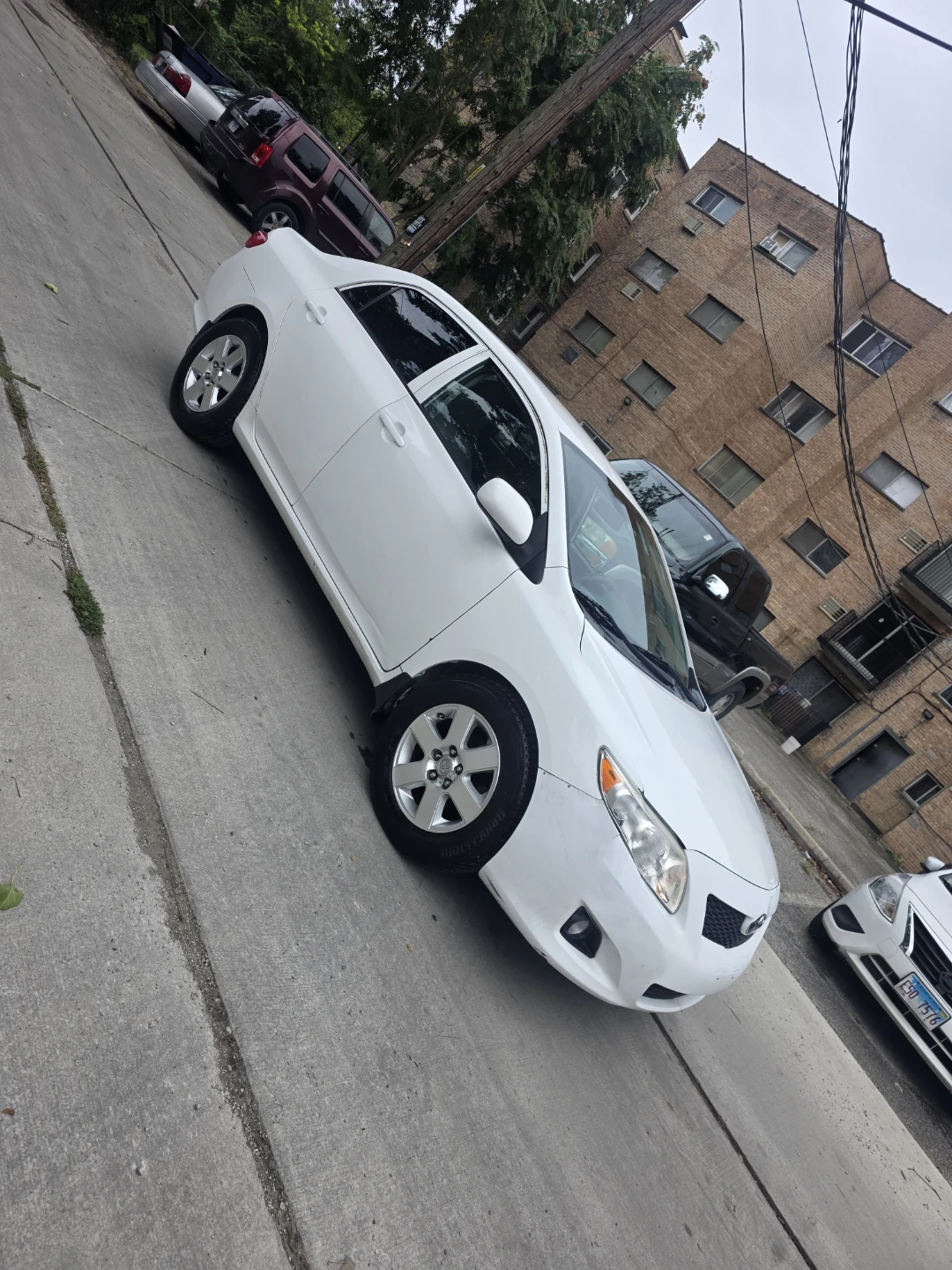 White Toyota Corolla - photo 3