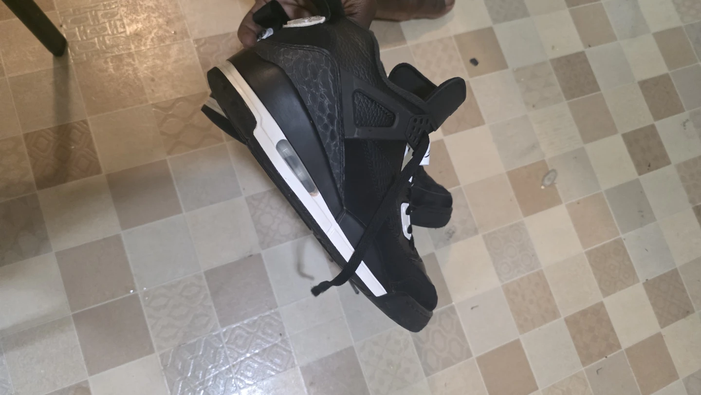 Jordan 4 Retro x 40 Acres and a Mule Sneakers