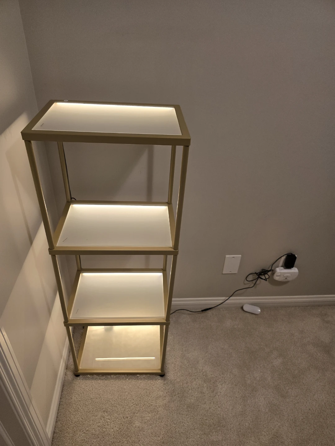 Gold Lit Shelving Unit