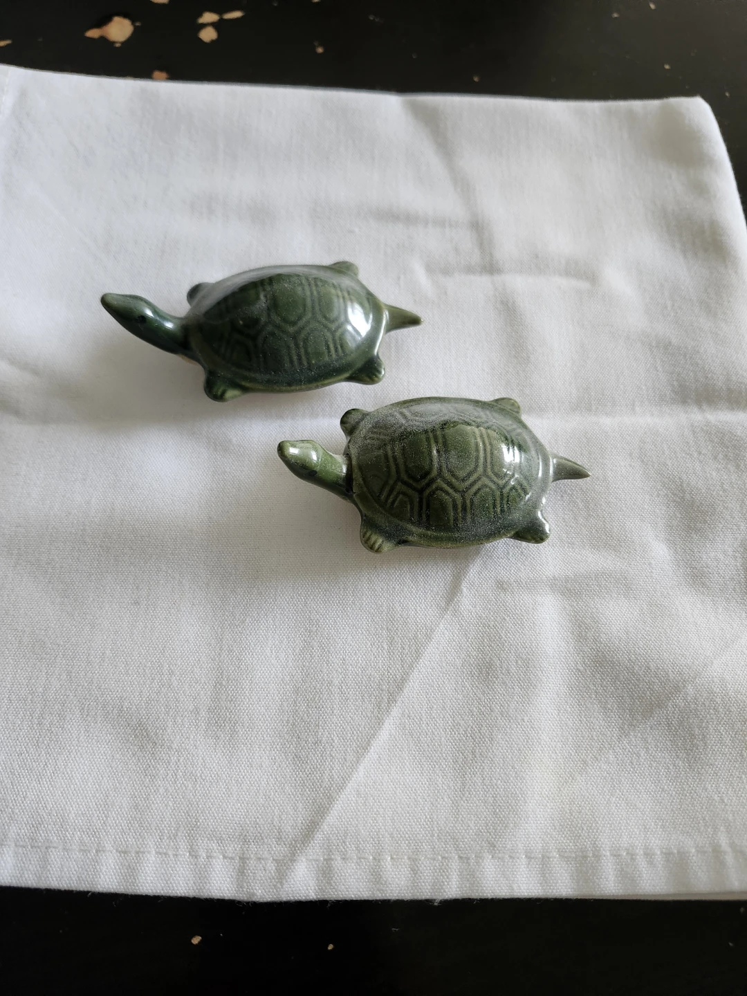 Pair of green ceramic turtle figurines