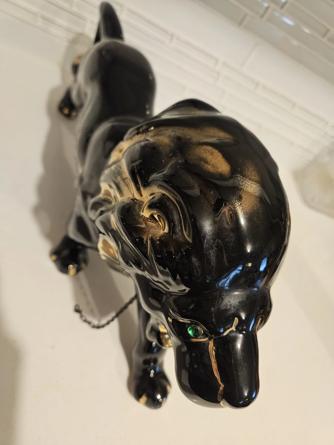 Striking black-and-gold ceramic lion - photo 5