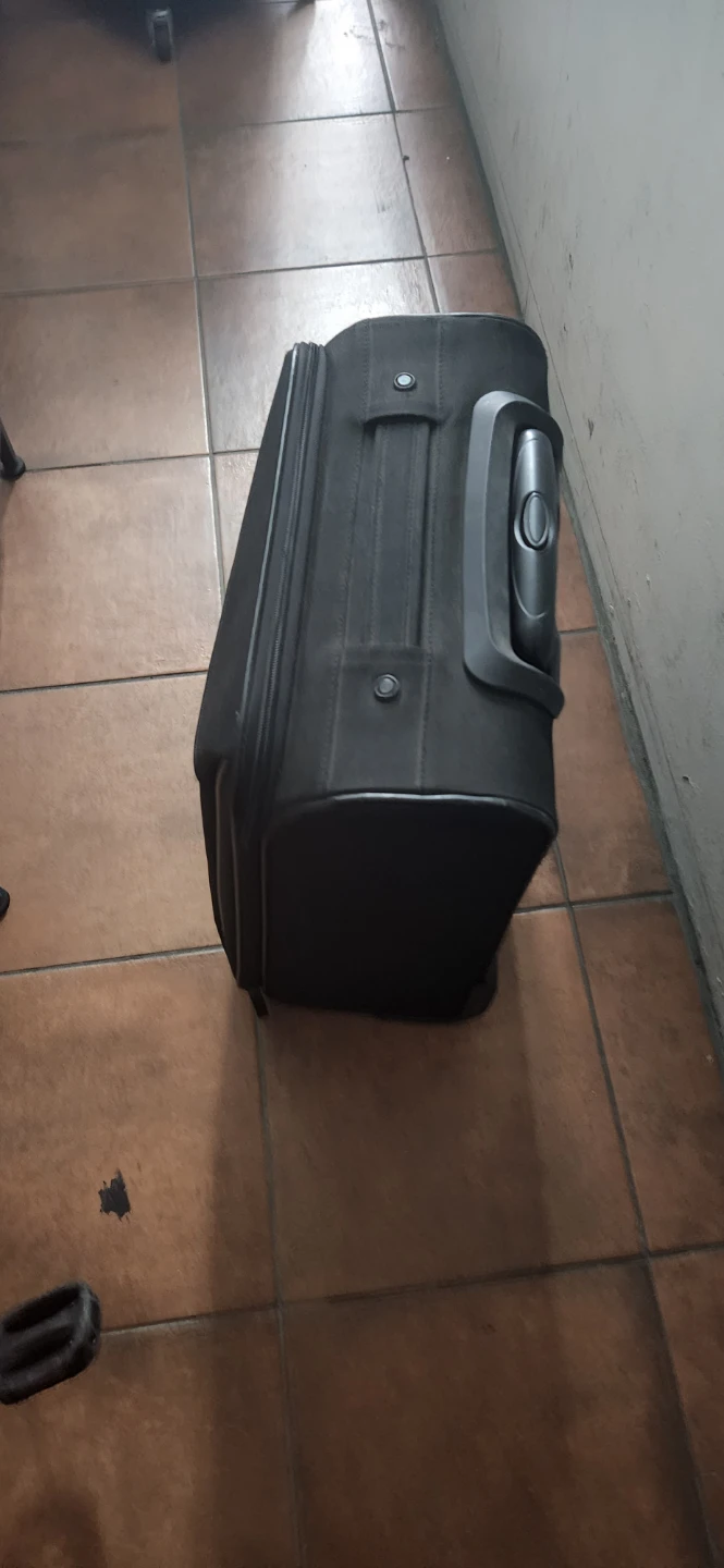 Black rolling suitcase
