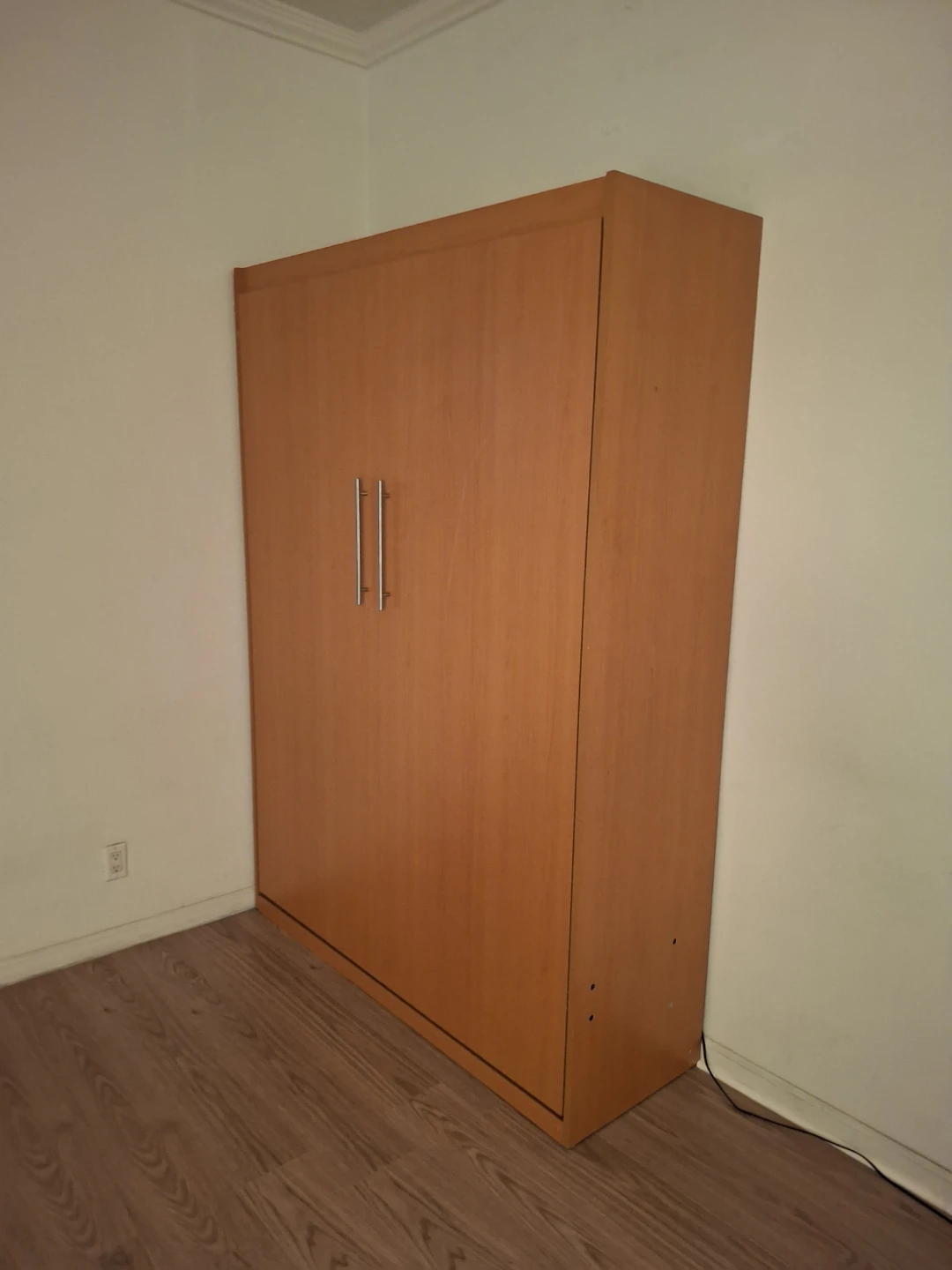 Murphy bed with built-in lights in Manhattan, NY