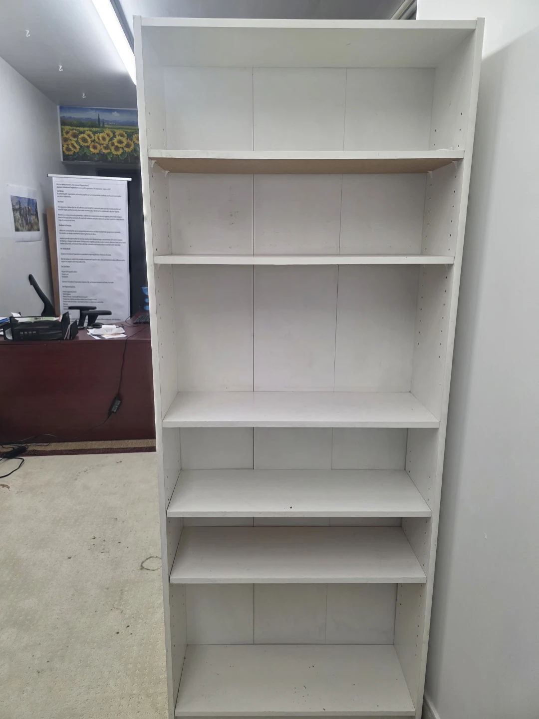 White tall bookcase with adjustable shelves