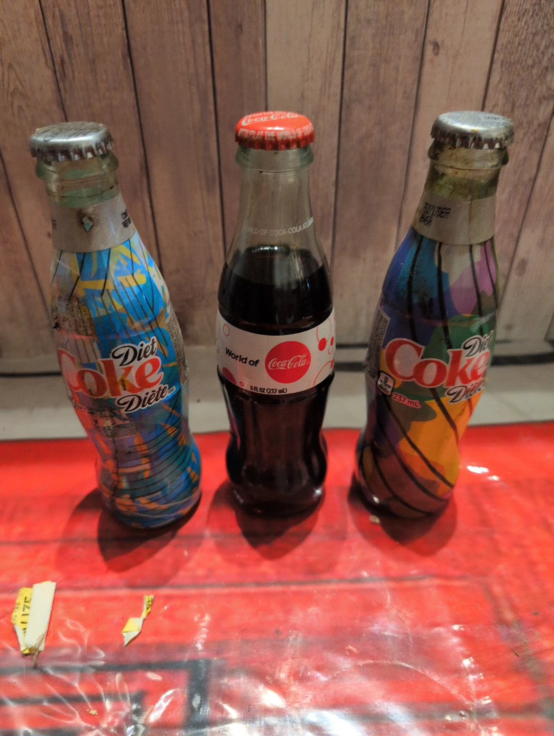 Three Collectible Coca-Cola Glass Bottles