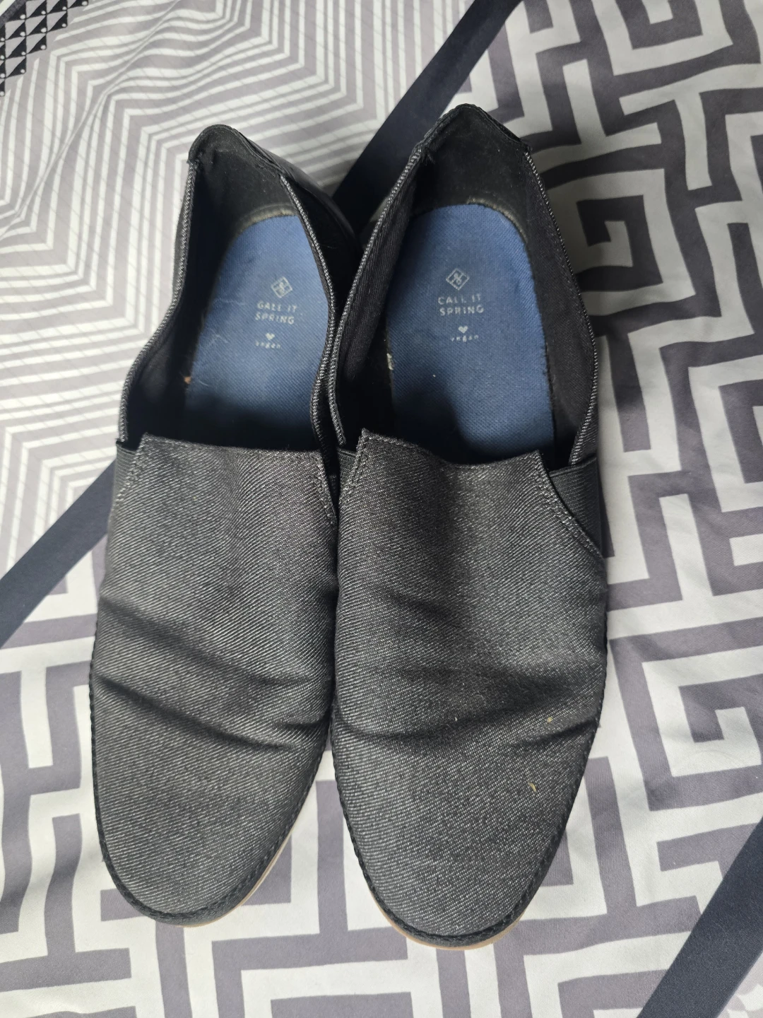 Call It Spring black slip-on shoes