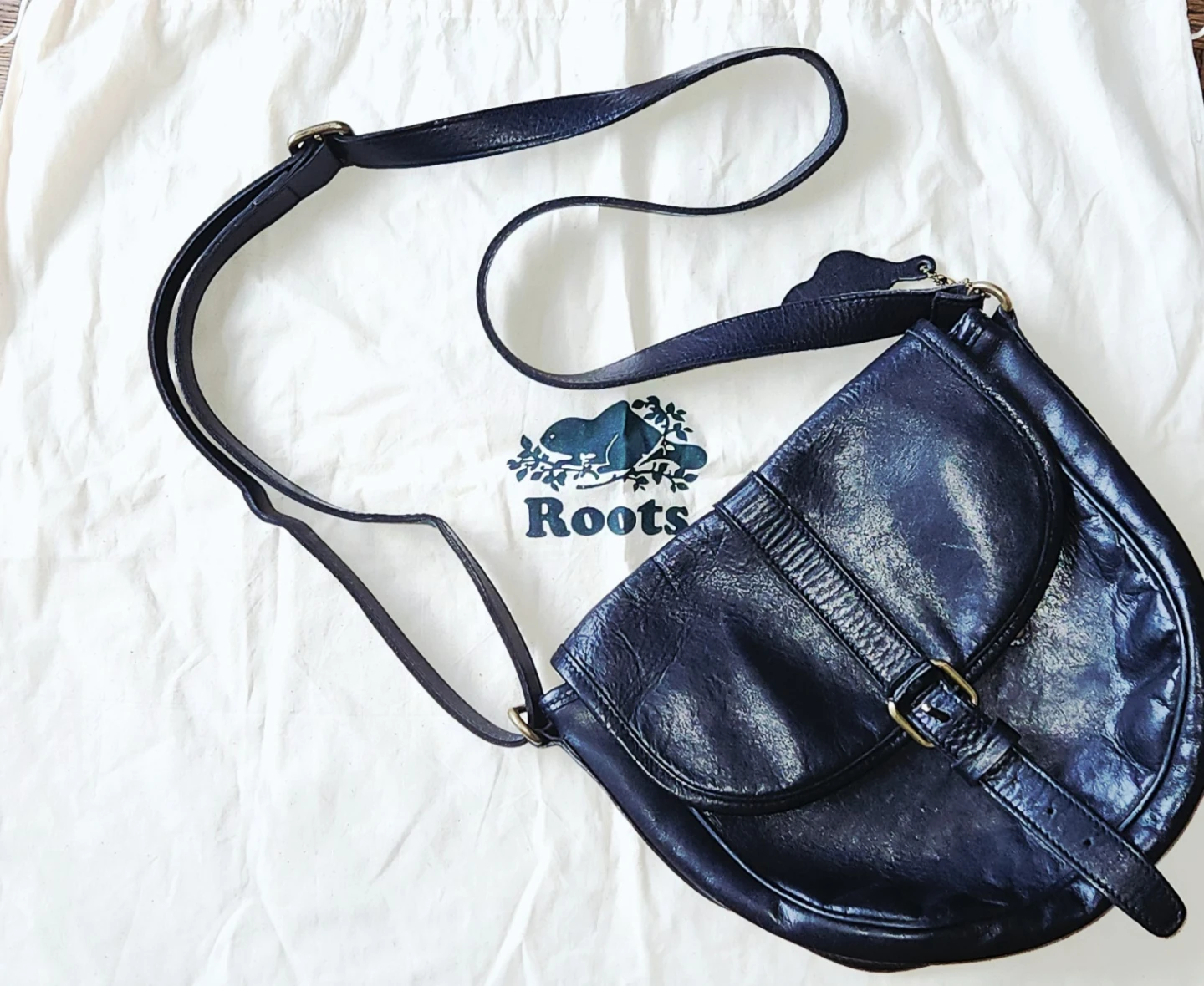 Roots vintage saddle bag with pink silk liner