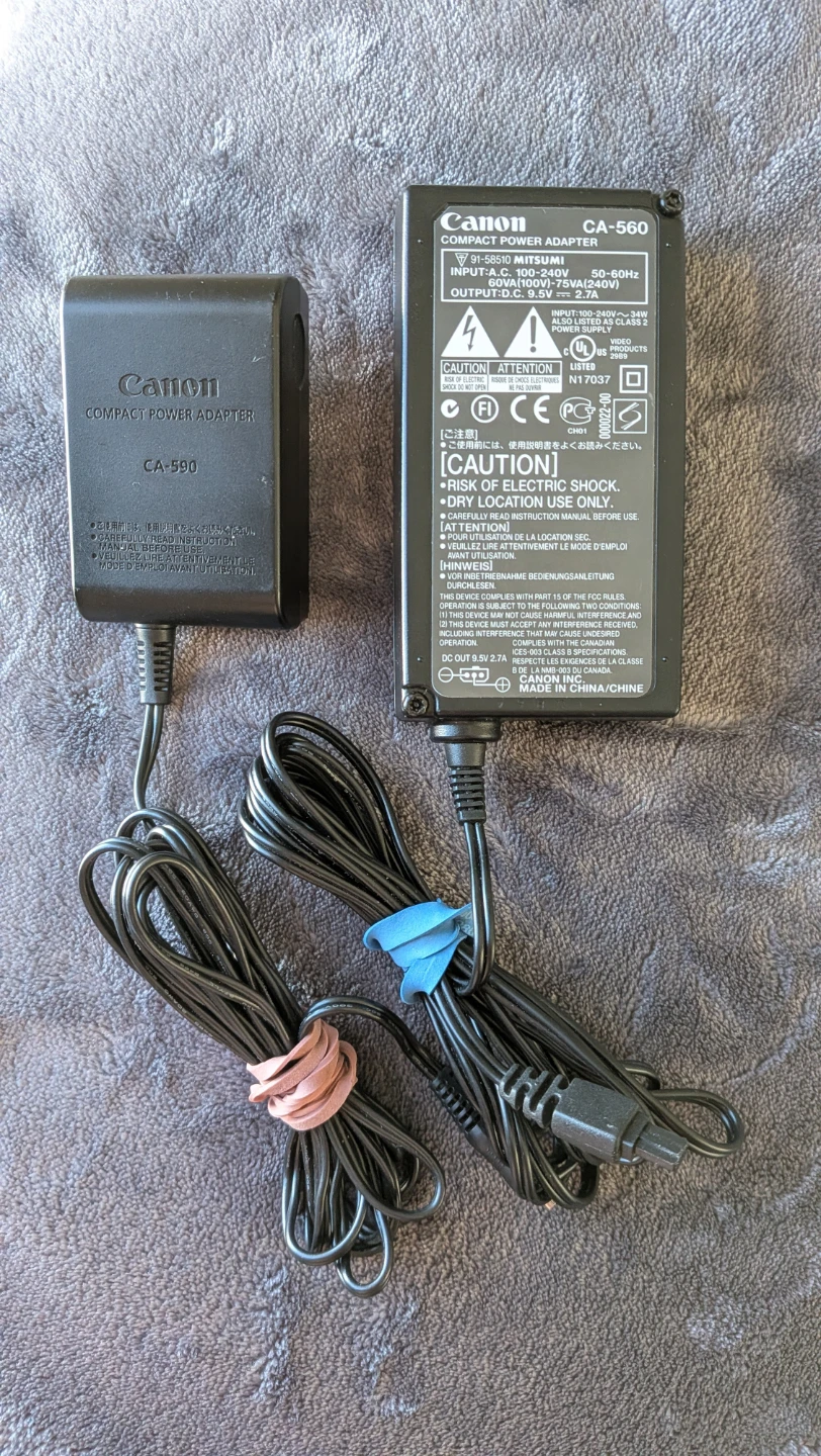 Assorted Canon Camera Battery Chargers and Adapters - photo 4