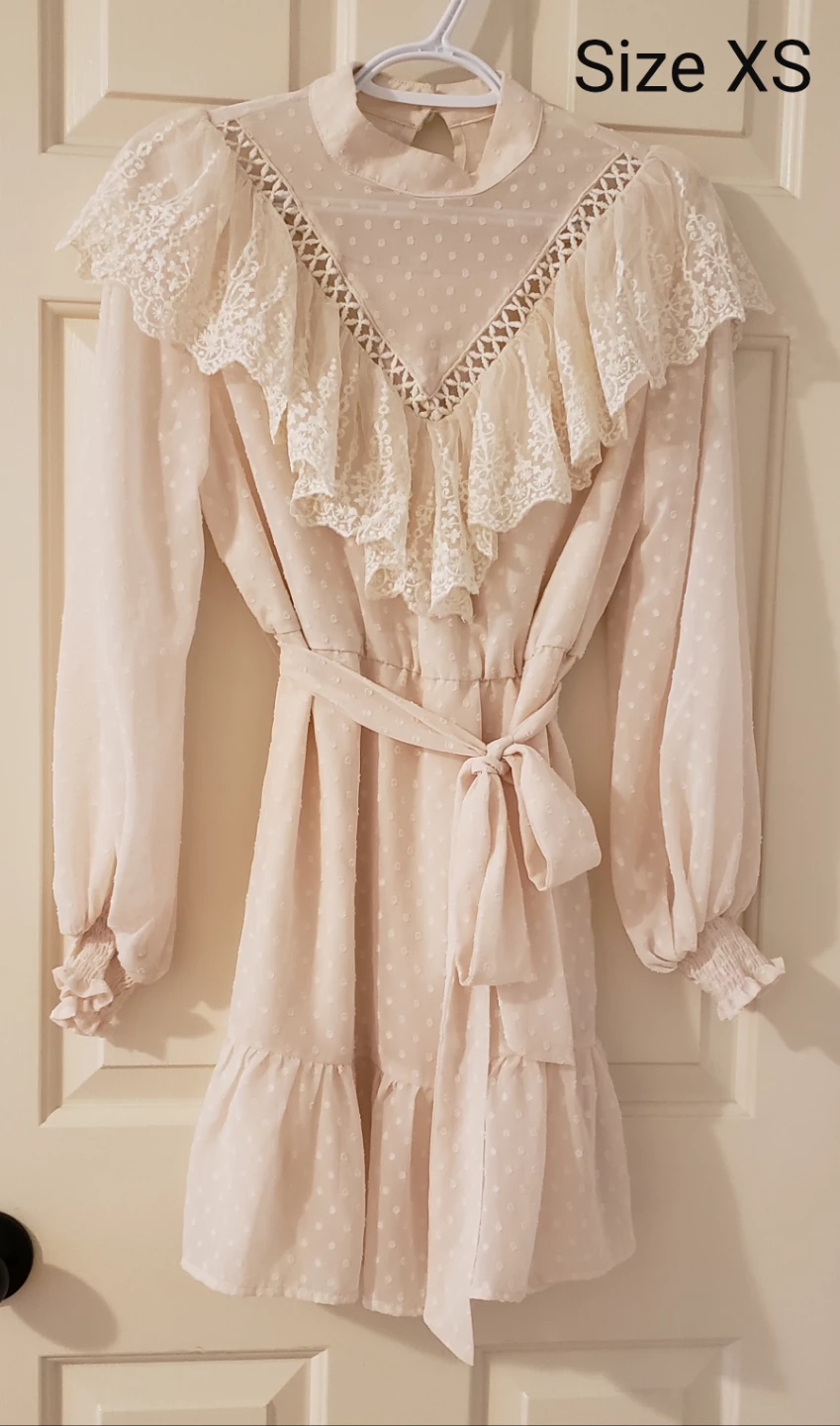 Ruffled cream dress