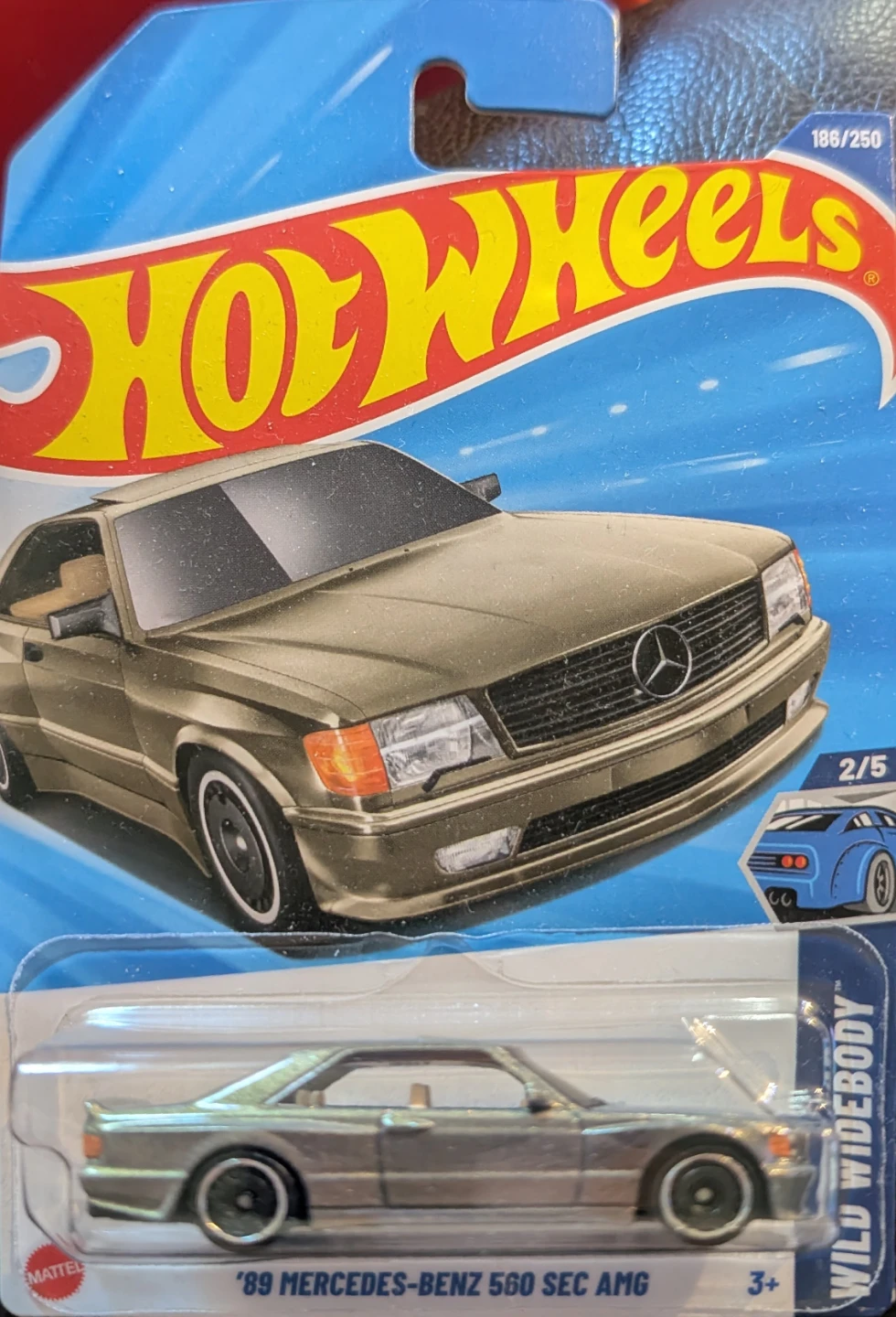 Hot Wheels '25: '89 Mercedes-Benz 560 SEC AMG (silver/gold)