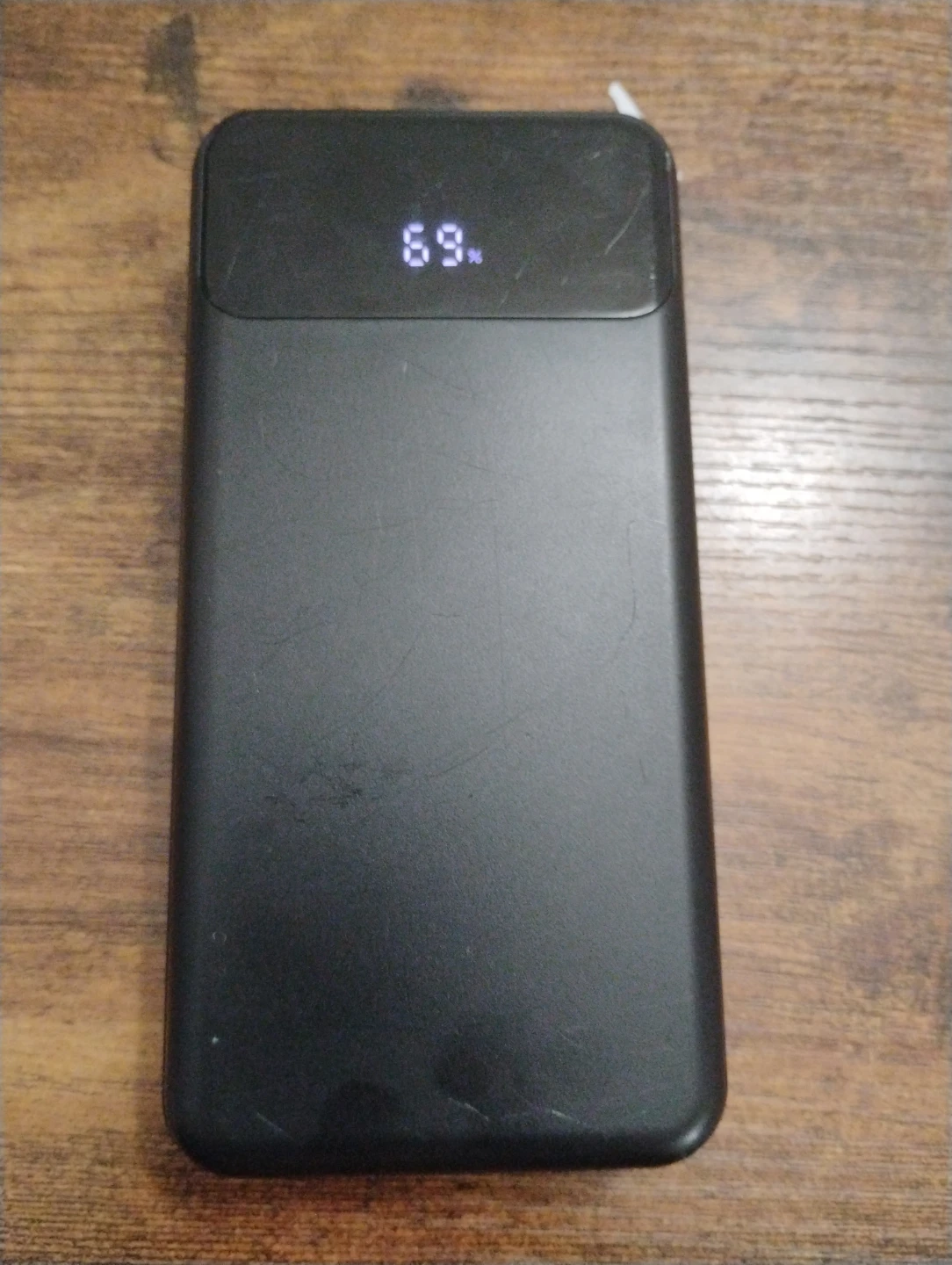 Black Portable Power Bank with Built-in Cables