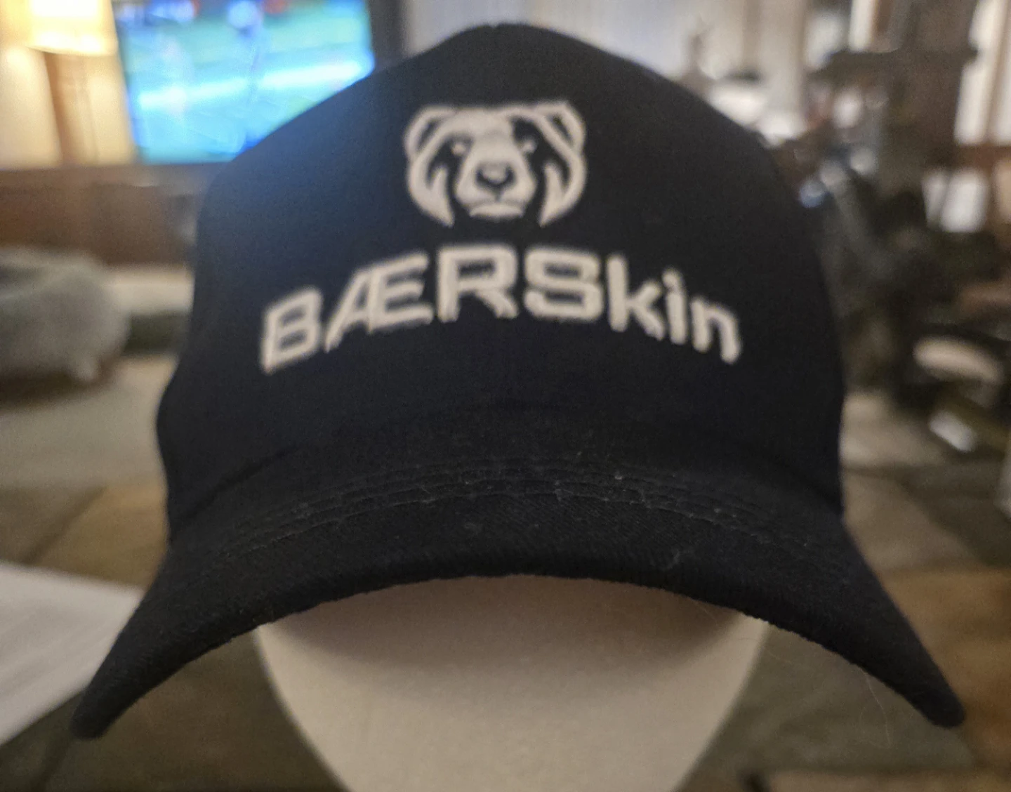 Baseball style hat/cap.  BÆRSkin Navy blue. Adjustable.EUC.
