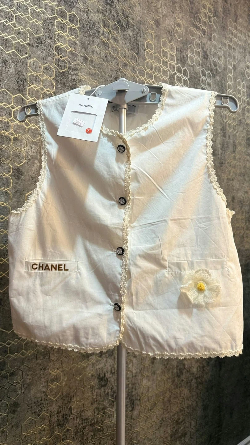 Chanel sleeveless button-up vest