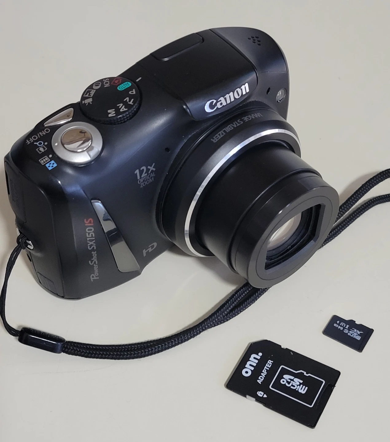 Canon PowerShot SX150 IS 14.1MP Digital Camera w/ 64GB Card