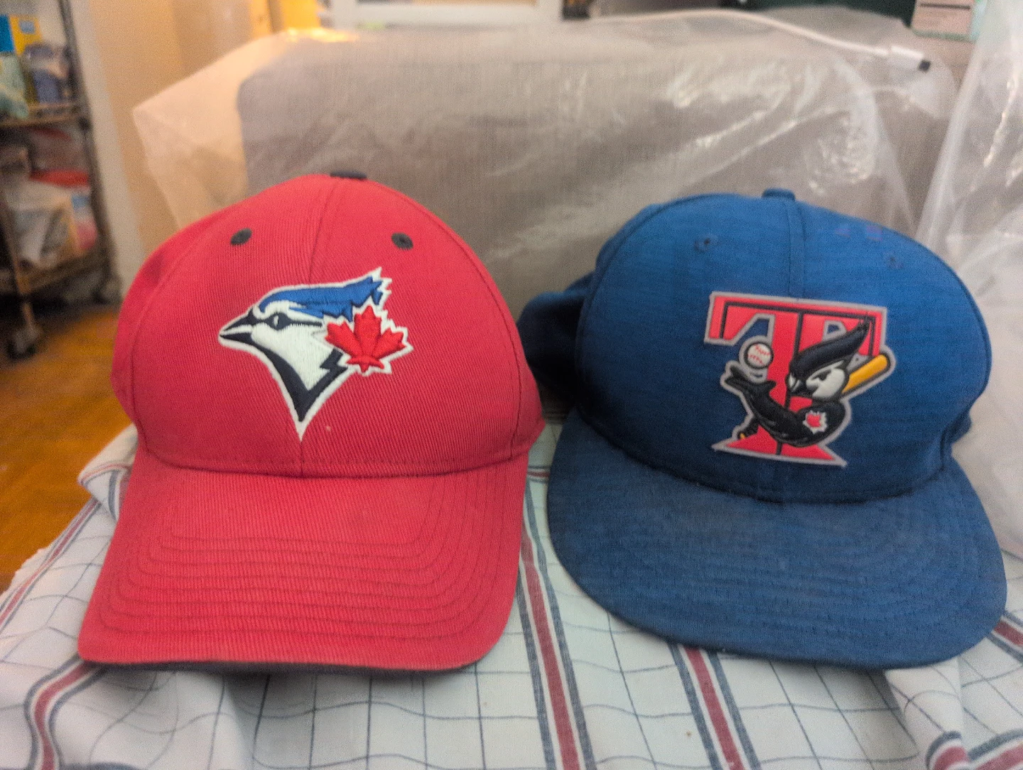 Two Toronto Blue Jays baseball caps
