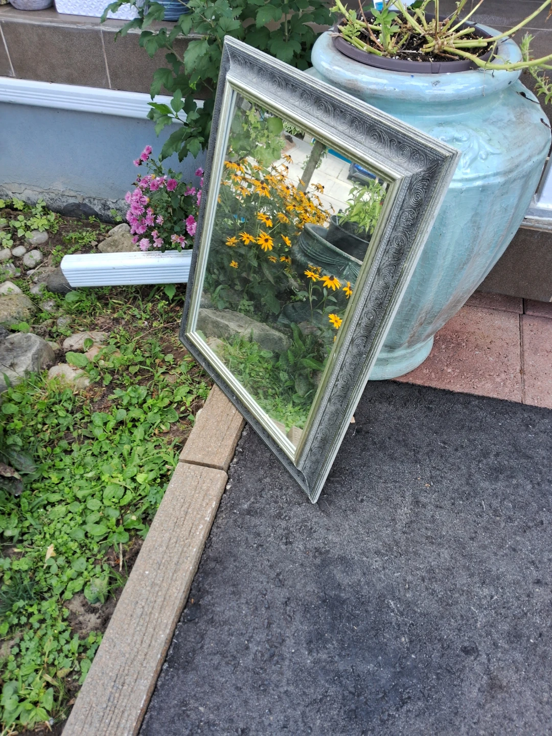 Decorative Wall Mirror with Ornate Silver Frame