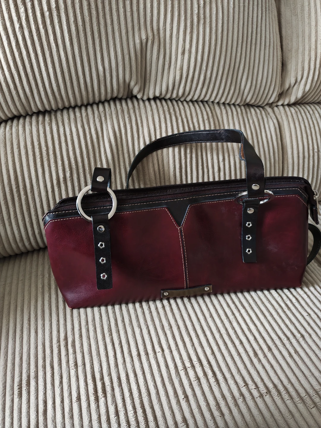 Red leather handbag