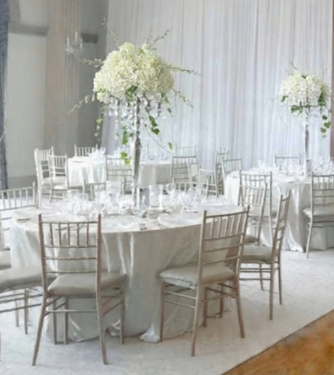 Wedding reception decor with floral centrepieces