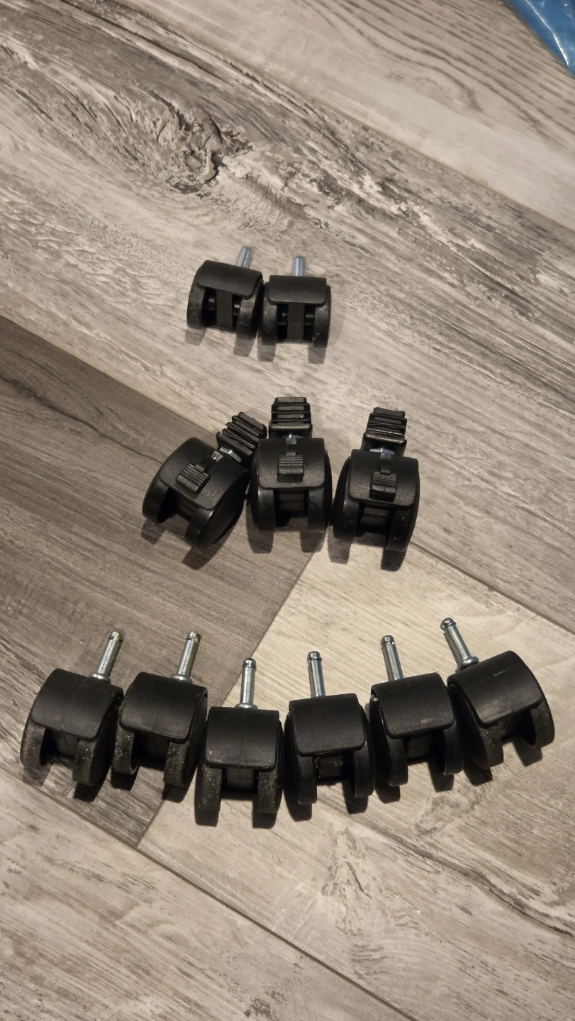 Used black caster wheels with metal stems