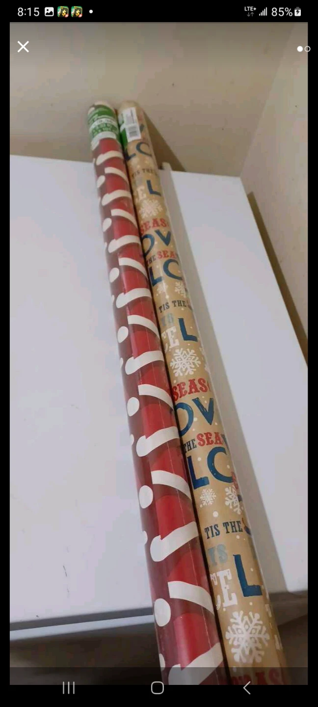 Two Rolls of Christmas Wrapping Paper