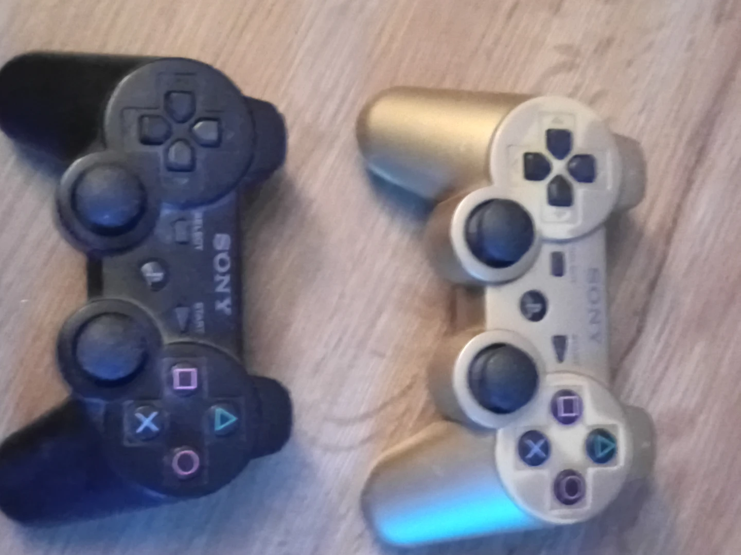 Two Sony PlayStation 4 Controllers