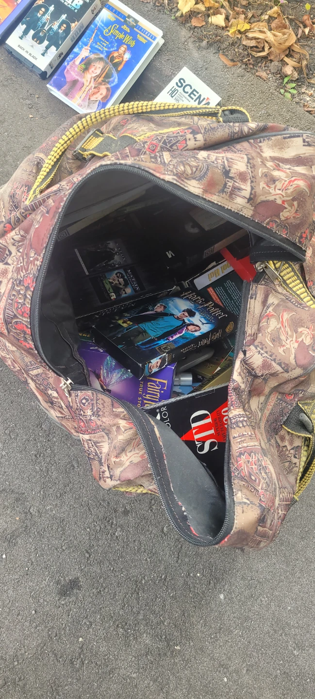 Large Duffel Bag with Assorted VHS Tapes and DVDs - photo 2