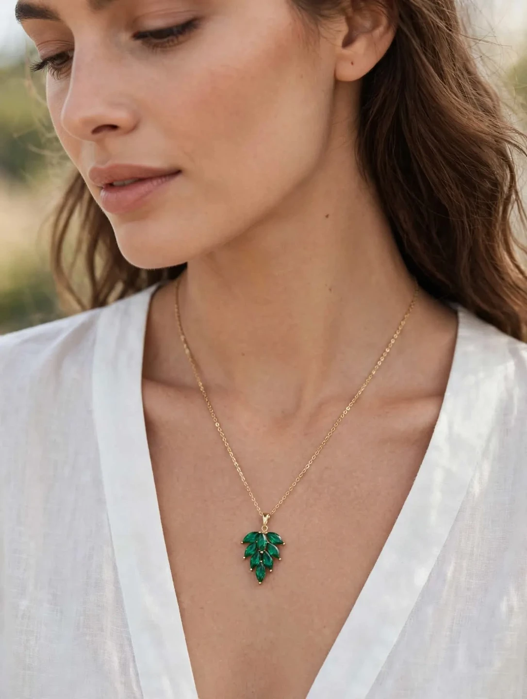 Gold-Tone Leaf Pendant Necklace with Green Stones