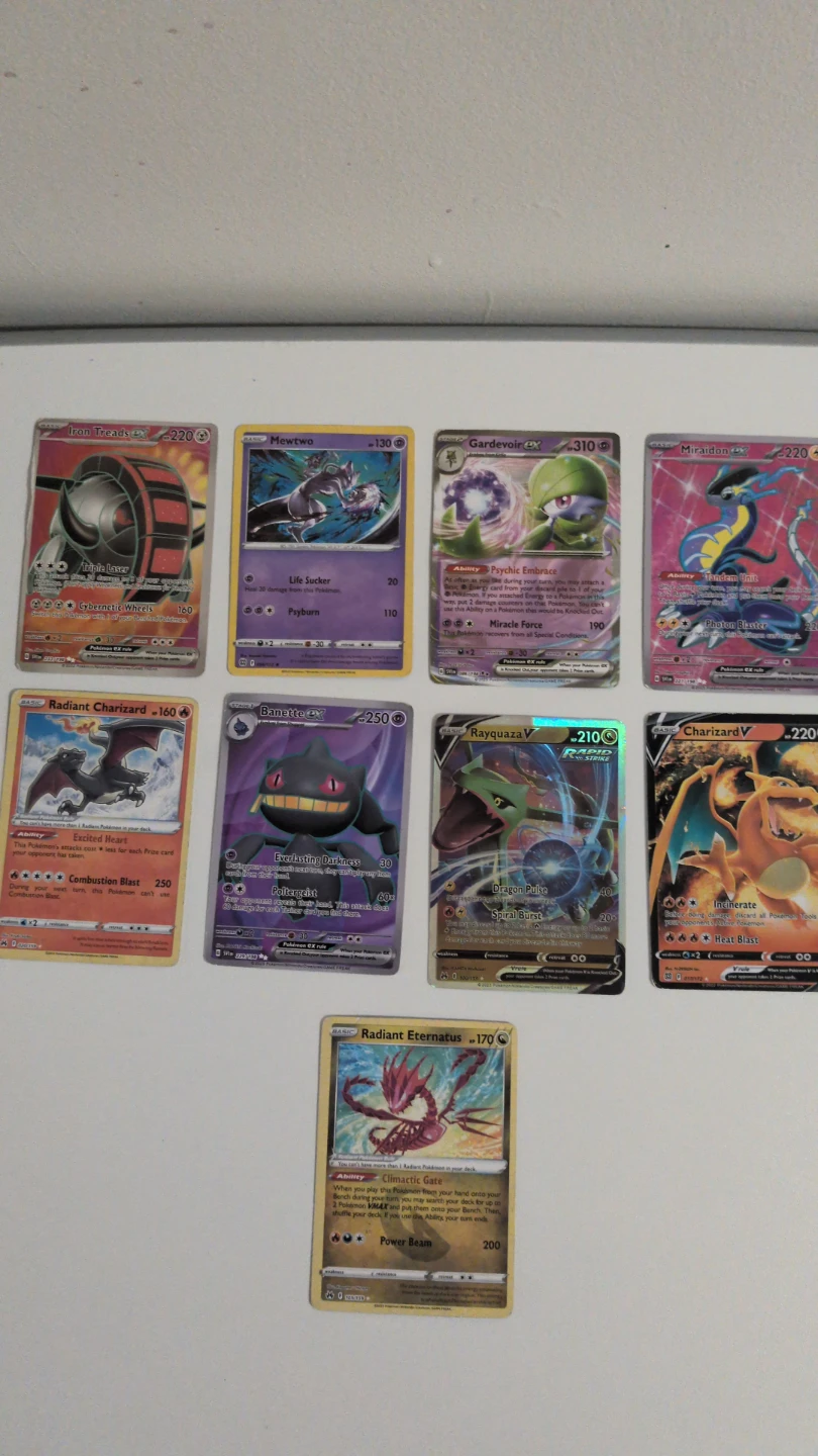 Assorted Pokemon Trading Cards - 9 Cards