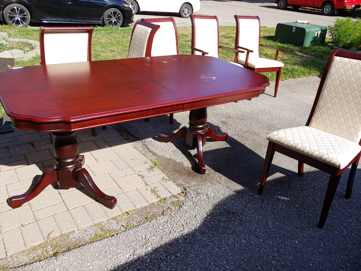 Dark wood dining table and 6 chairs