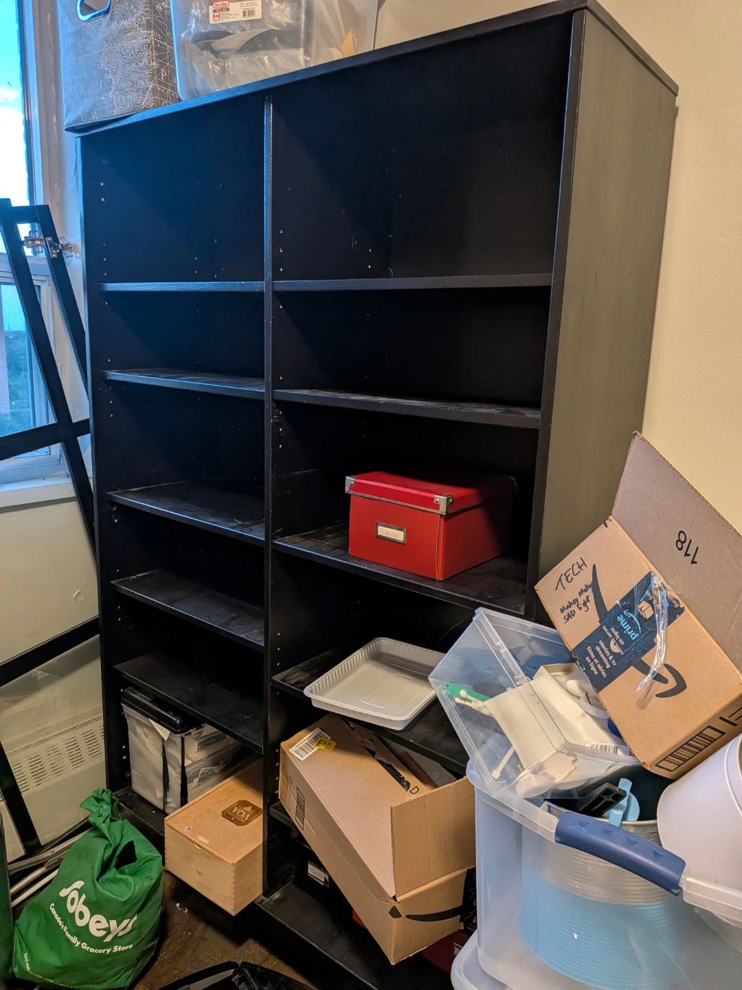 **Disassembled** black Ikea bookcase