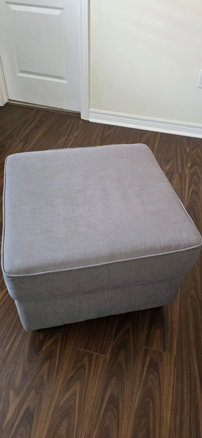 Grey fabric ottoman