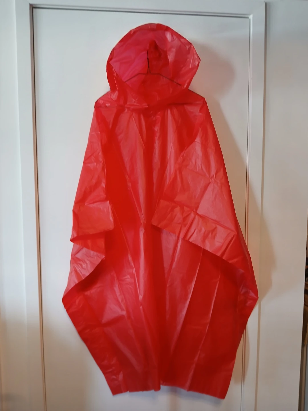 Red plastic emergency raincoat.