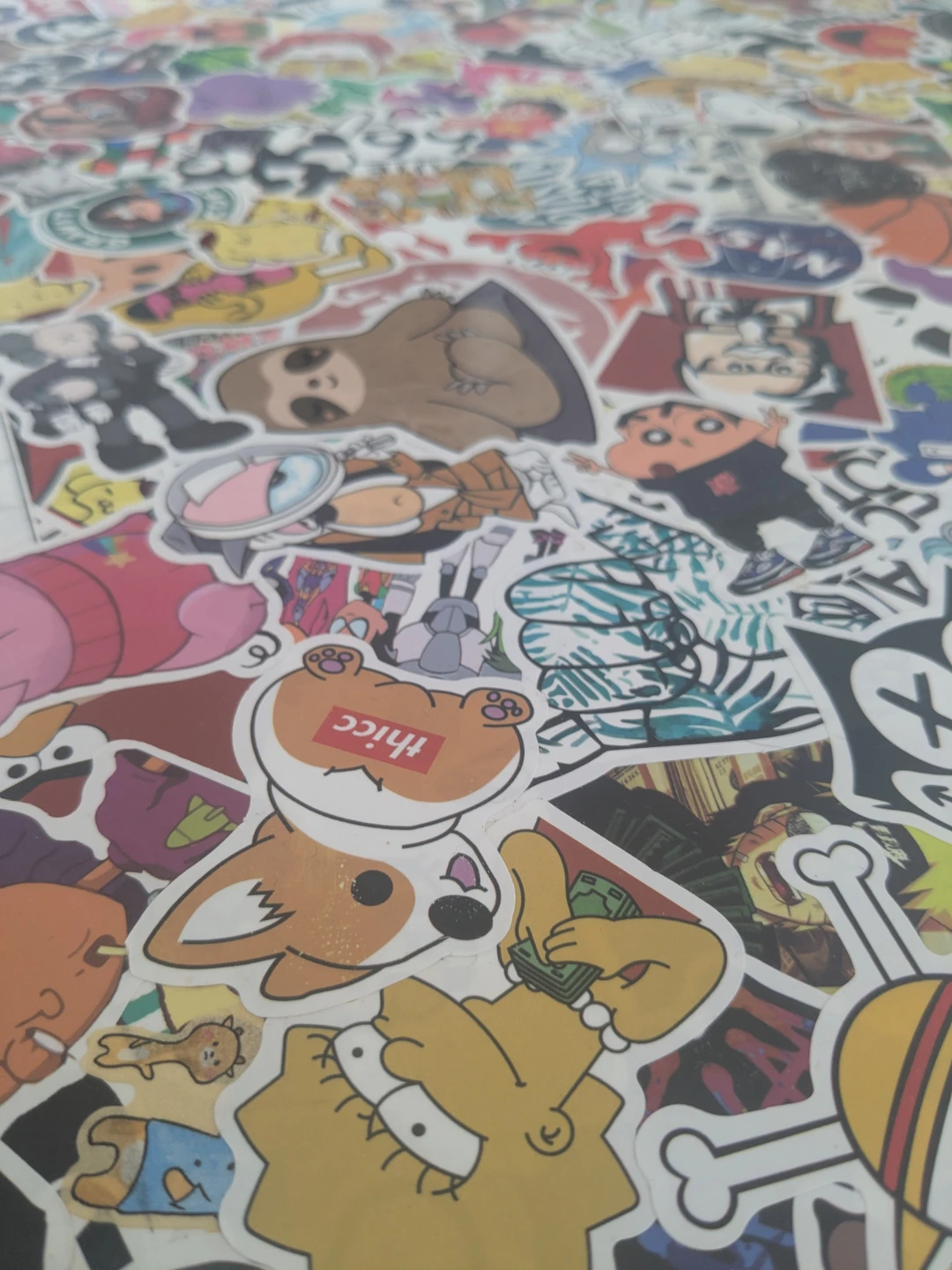 White desk with custom sticker-bombed top - photo 4