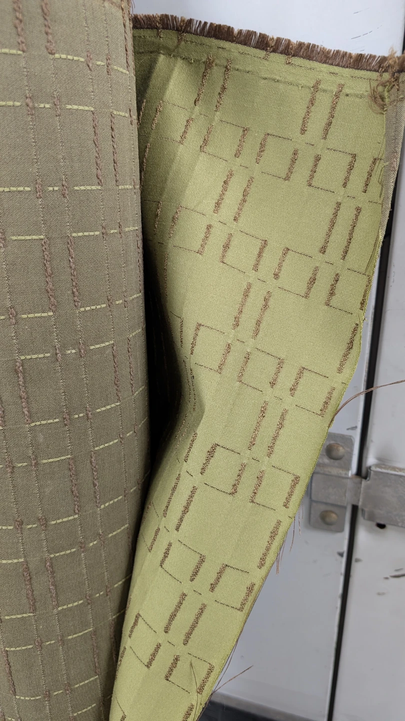 Partial bolt of green & brown upholstery fabric