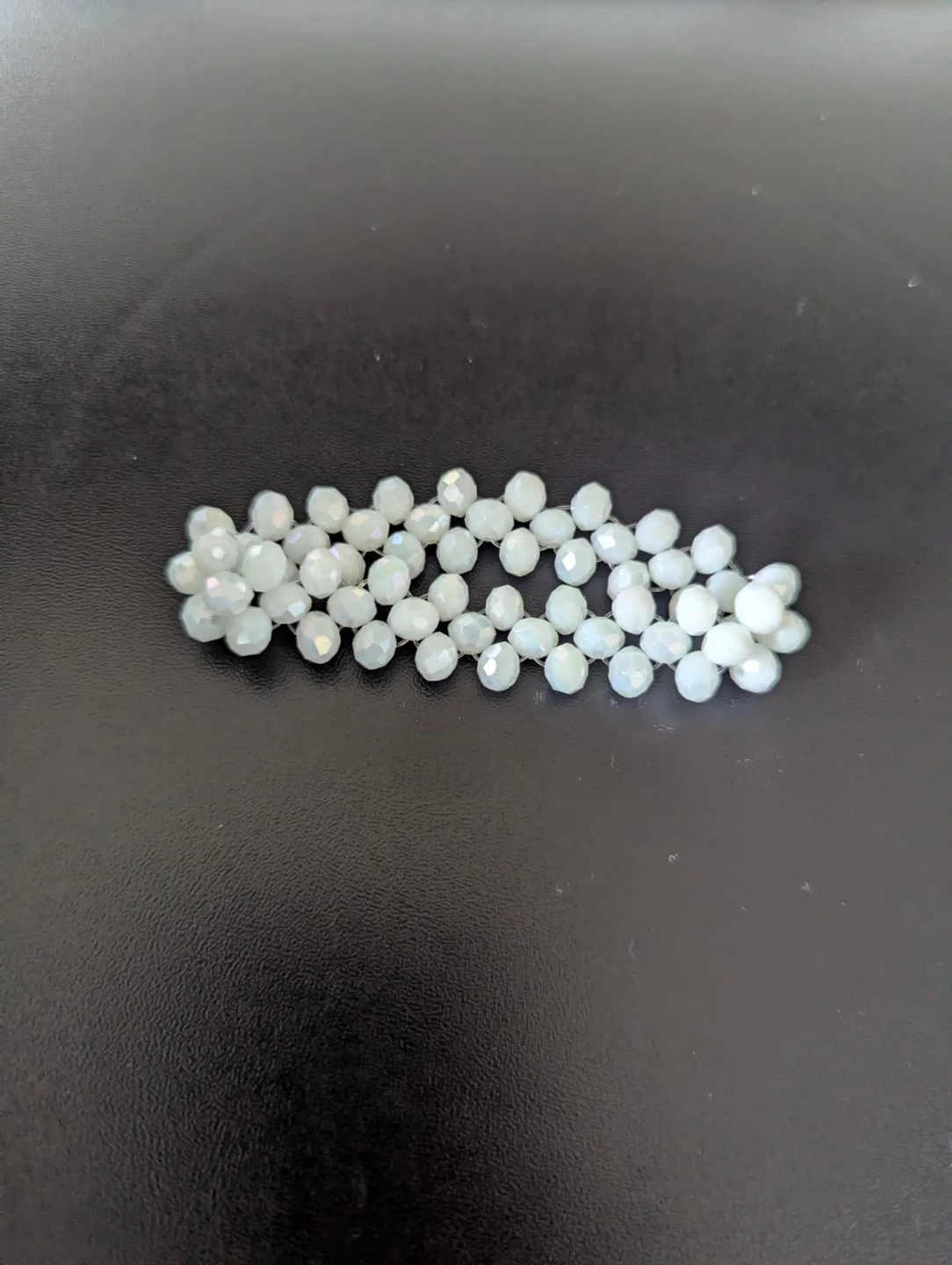 White beaded stretch bracelet🏈