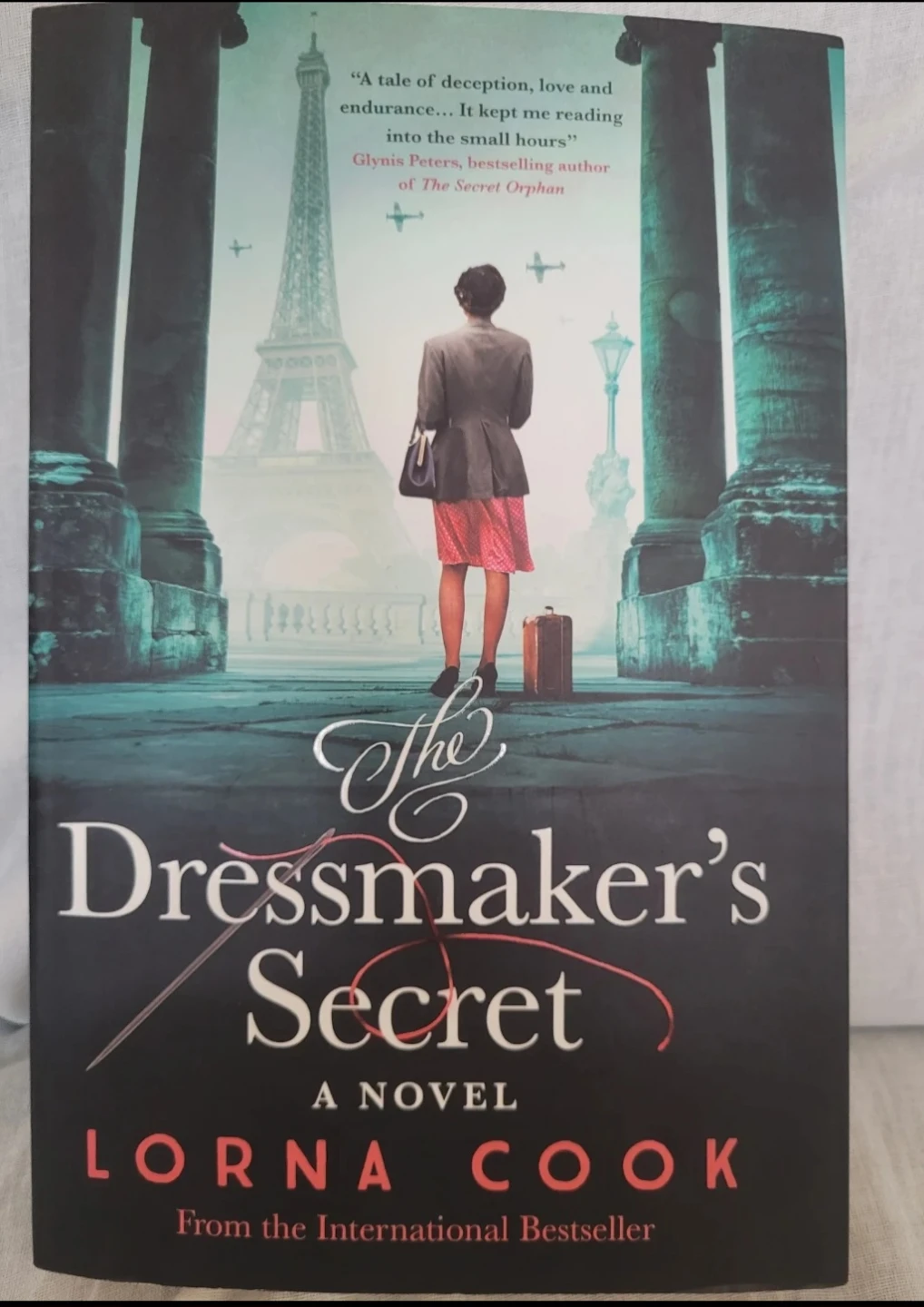 The Dressmaker's Secret A Novel by Lorna Cook