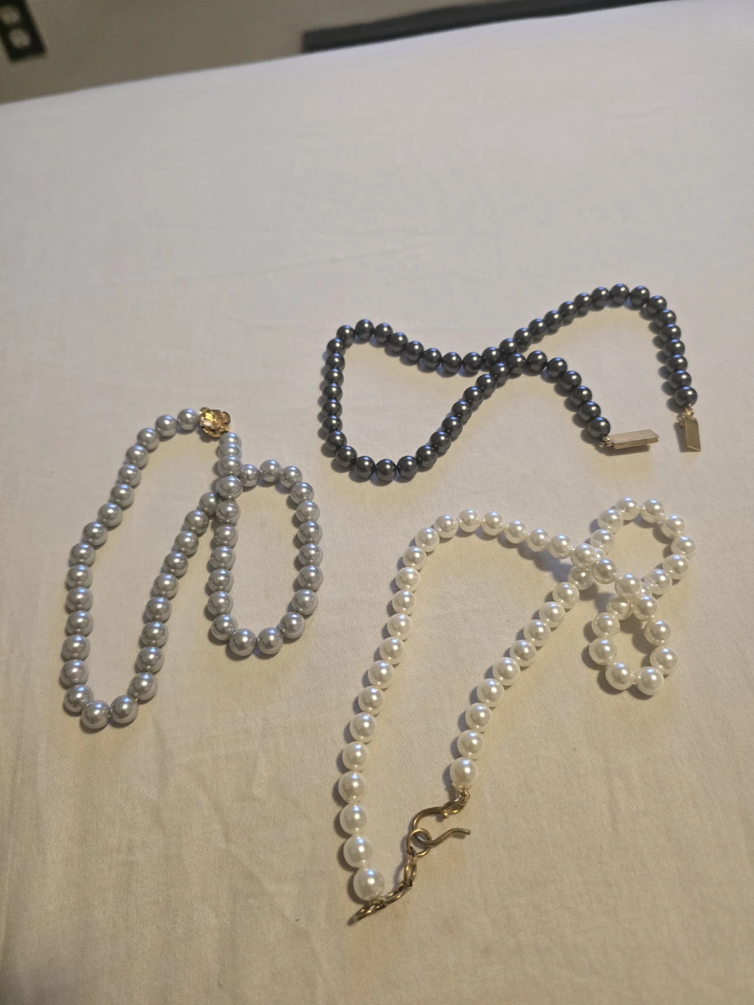 Set of three faux pearl necklaces