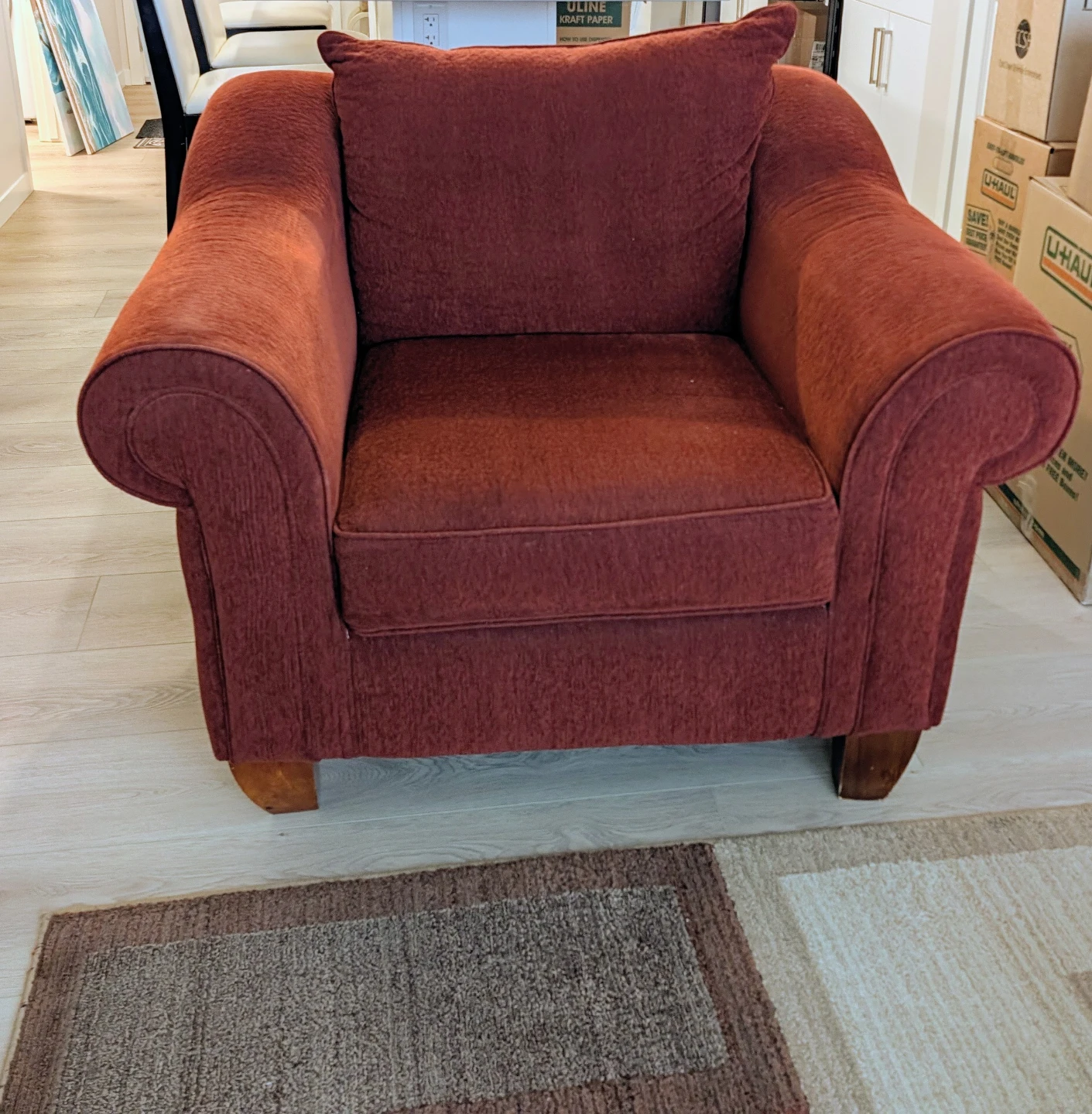 Red fabric armchair, ottoman and loveseat set