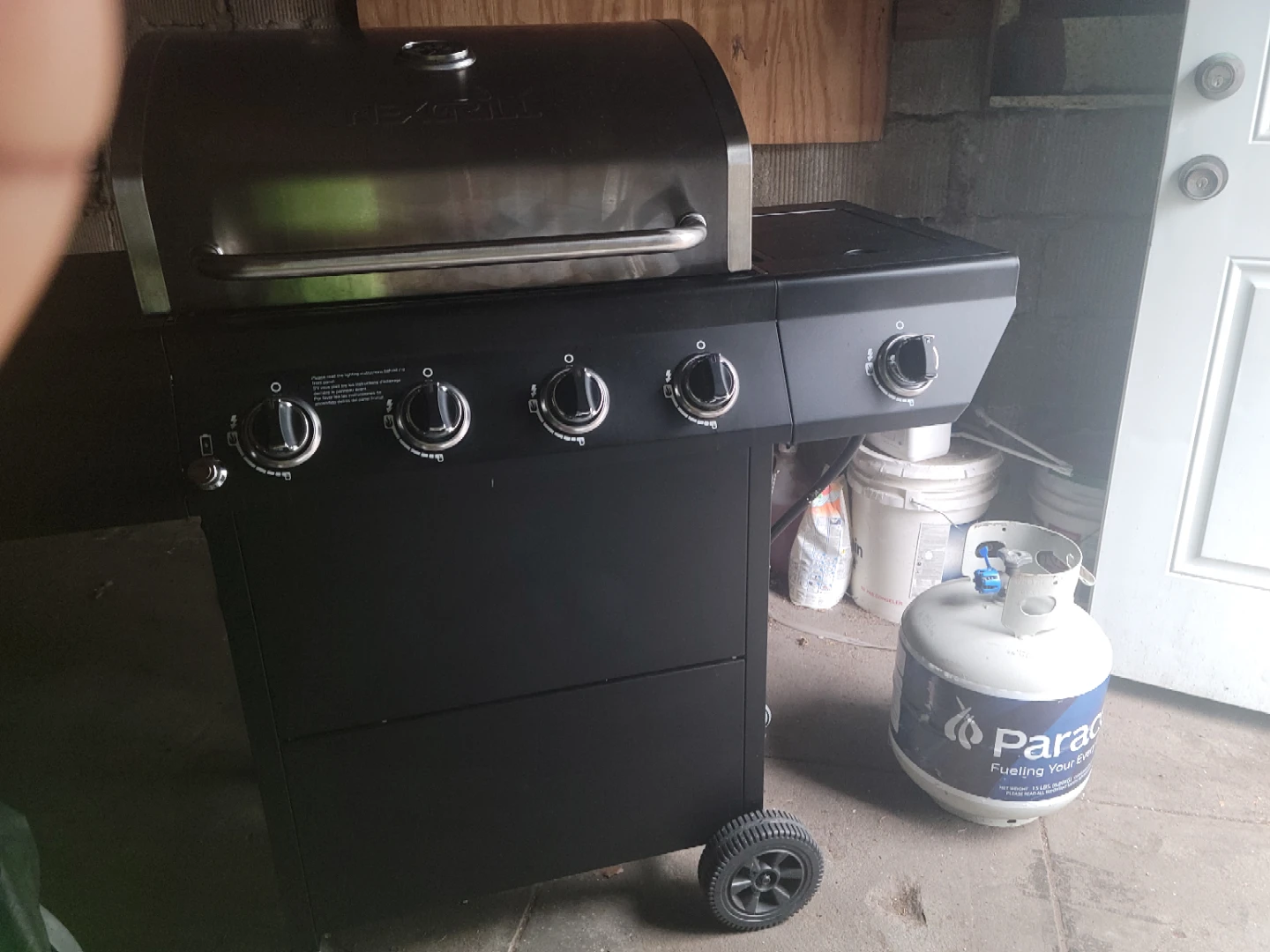 Nexgrill 4-Burner Gas Grill with Propane Tank