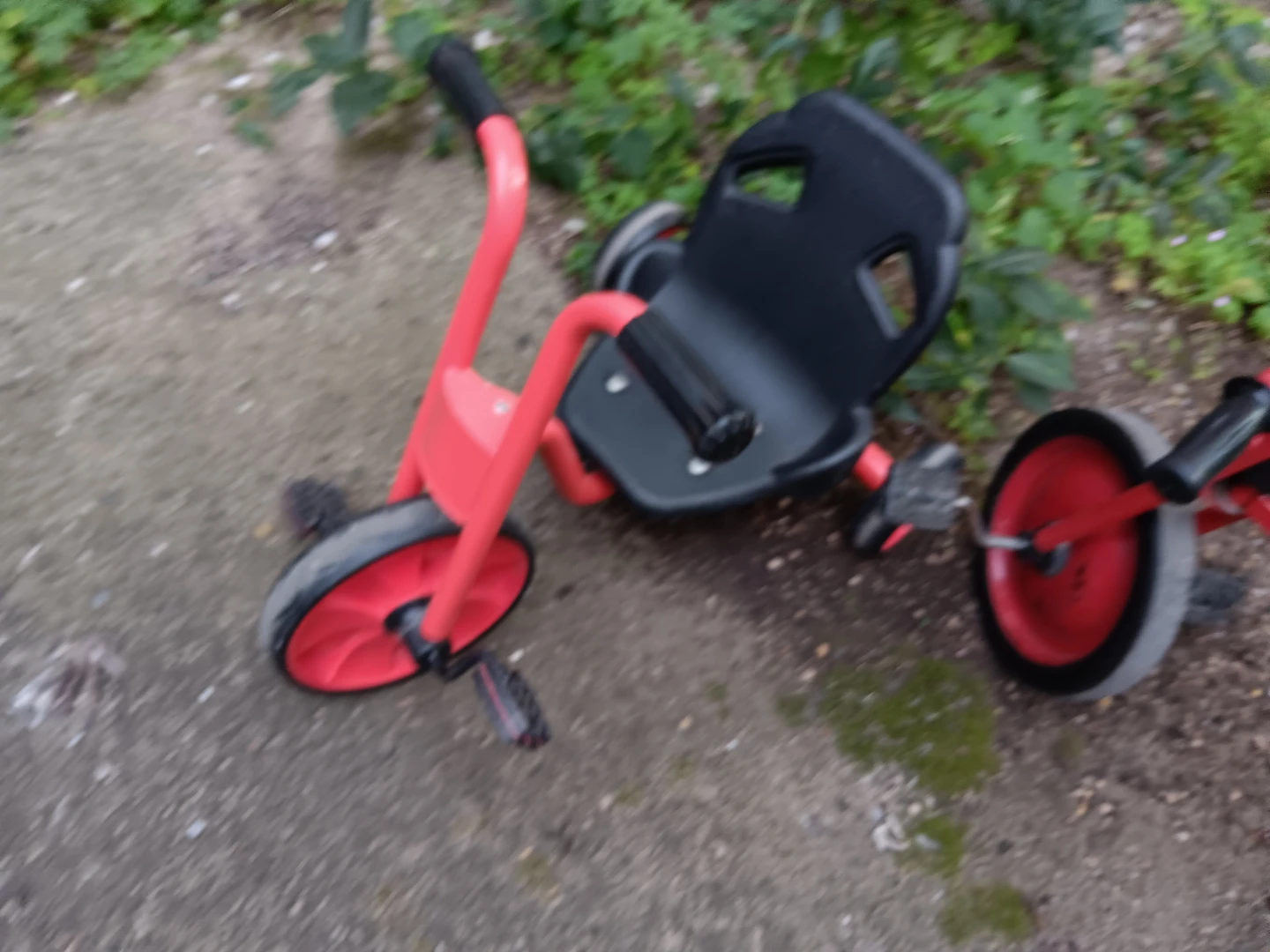 Red and black toddler tricycle