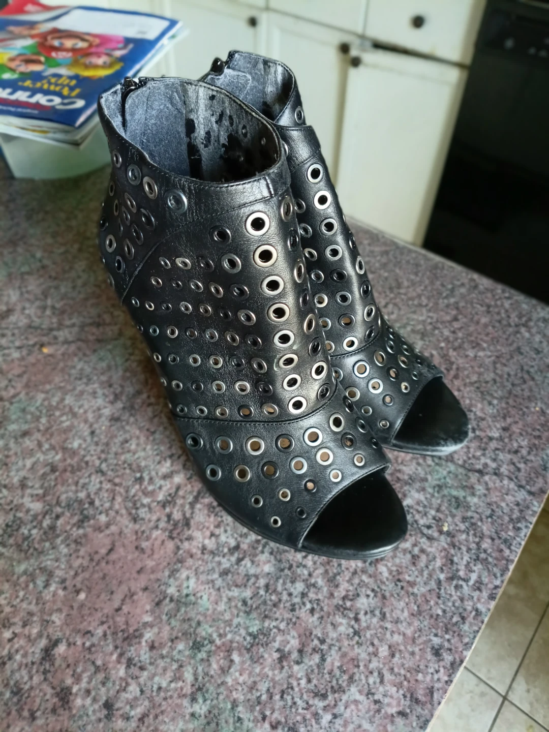 Black grommet open-toe booties size 10M