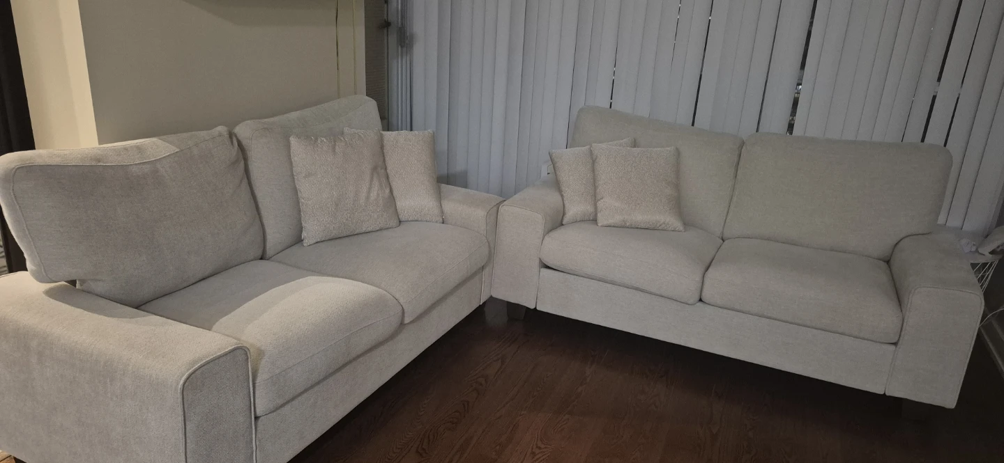 Set of two light beige sofas