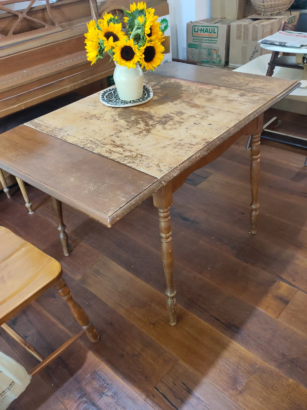 Wooden drop-leaf dining table