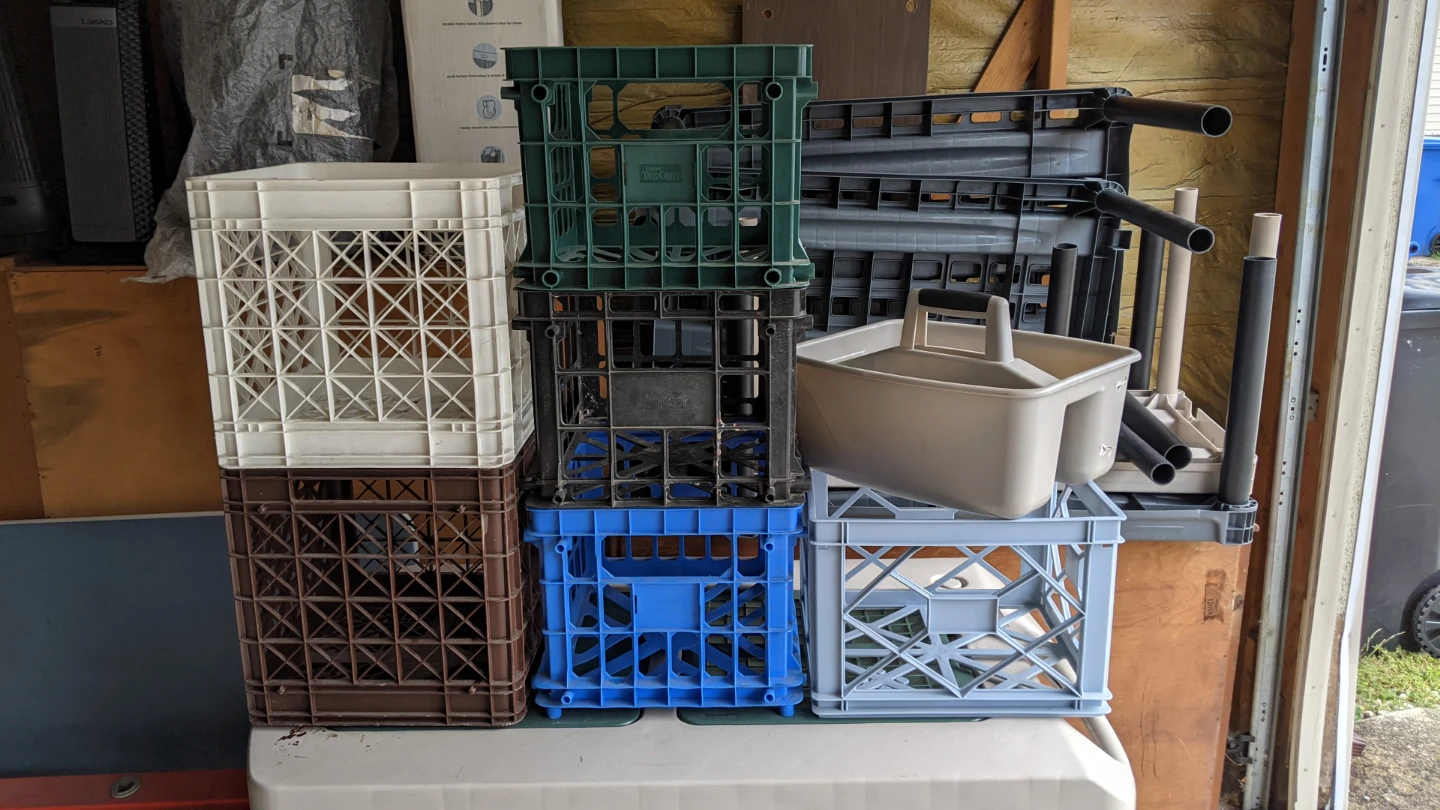LOT OF 7 MILK CRATES ITEM HOLDER