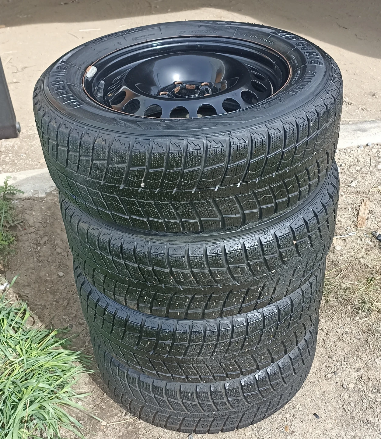 Winter tires on Rims 215-60-16 Green Max.Like new.Off Chev Cruze