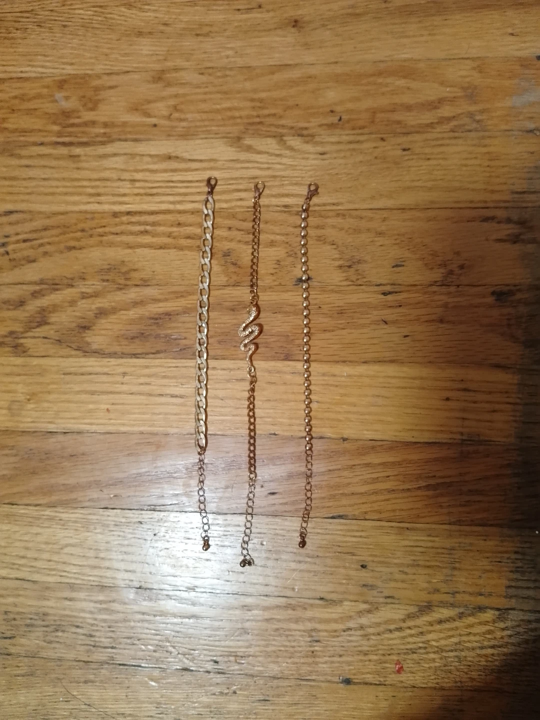 Set of new 3 gold-toned bracelets