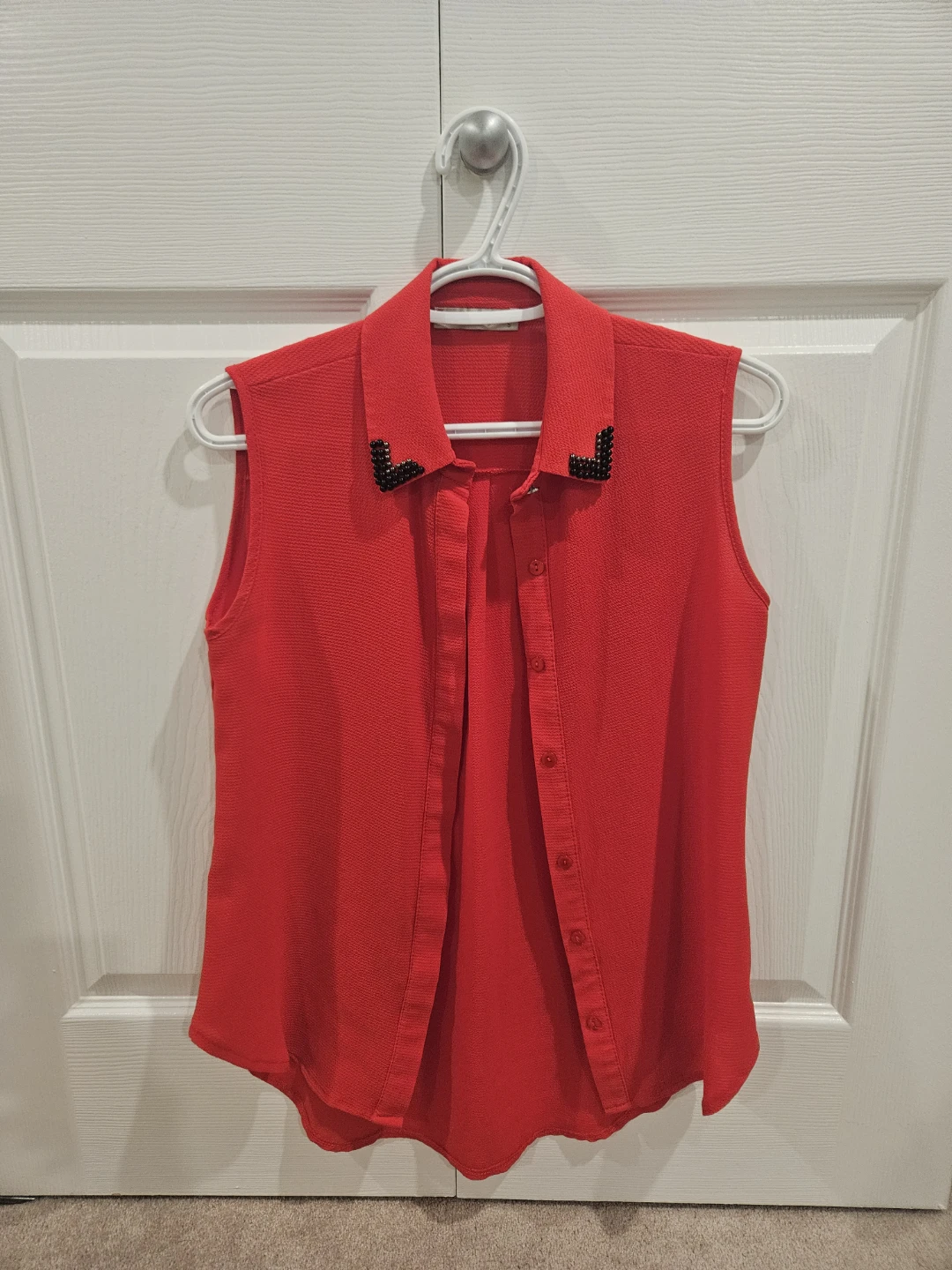 Red Sleeveless Collared Blouse with Embellishment